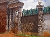 Mbouda-Bamenda road: Bas relief decoration on exterior of Bamileke chieftancy