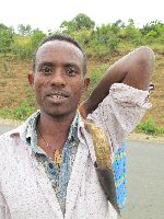 Man along Hwy 3, near Adis Zemen, Ethiopia