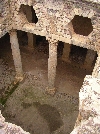 Subterrainian level of villa, with hexagonal window for better light, Bulla Regia