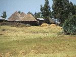 Amhara houses and haystacks, near Sulutan, Ethiopia