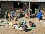 Women working outside of flour mill, Tilili, Ethiopia