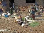 Women working outside of flour mill, Tilili, Ethiopia