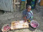 Girl cooking, Gashena-Lalibela road, Ethiopia