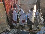 The faithful pray at Bet Giyorgis - St. George (rock hewn church), Lalibela, Ethiopia