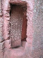 Door to tunnel near Bet Gabriel-Rafael (rock hewn church), Lalibela, Ethiopia