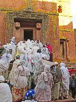 The faithful come to pray at Bet Giyorgis - St. George (rock hewn church), Lalibela, Ethiopia
