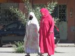 Women walking, Er Rich, Morocco
