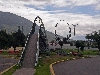 Quito; round point, pedestrian bridge and sculpture