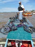 Loading Bike Friday on boat, Essequibo River, Guyana