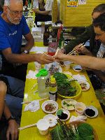 Digging into a meal for raw fish, Sindonga Fish Market