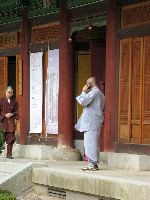 monk on cell phone, Woljeongsa