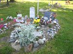 mementoes left at the graves in Swinomish cemetery