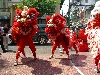 Lion dancing at business opening, Saigon