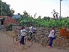 Girls arriving from school on their bicycles, Pleibroum