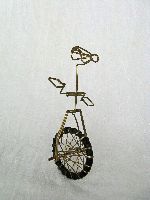 Plated wire and rubber unicycle sculpture from Harare, Zimbabwe